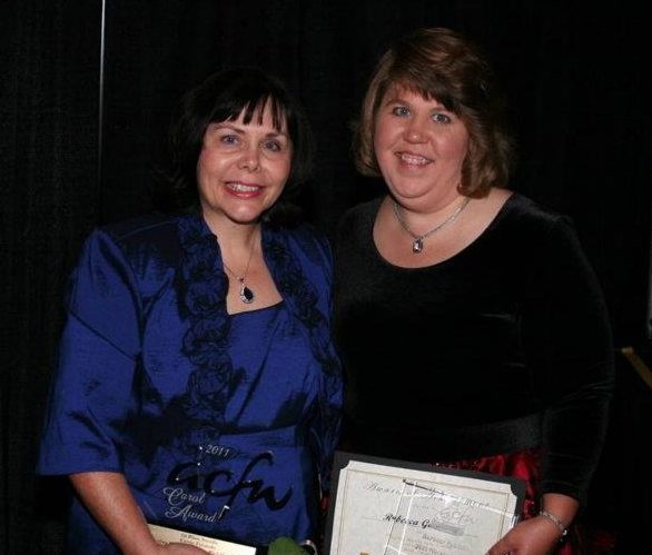 Carrie wins the 2011 ACFW Carol Award. Carrie's editor Becky Germany, Barbour